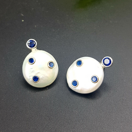 Pearl earrings with blue zircon